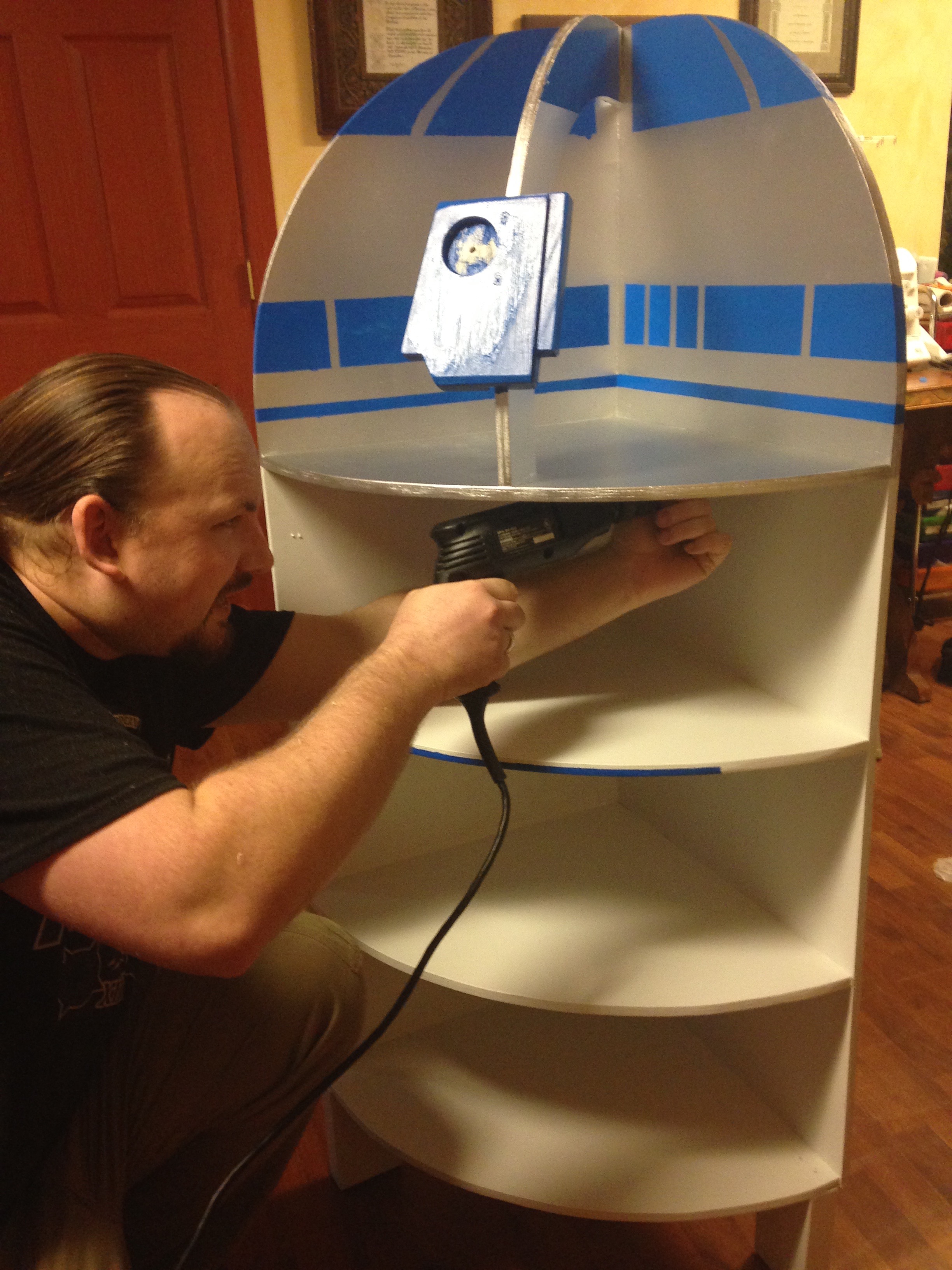 How to make a Star Wars R2-D2 corner shelf from a sheet of plywood. | JenuineMom.com