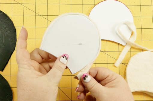 Attach the batting strip to the outer edge of the foam mouse ear