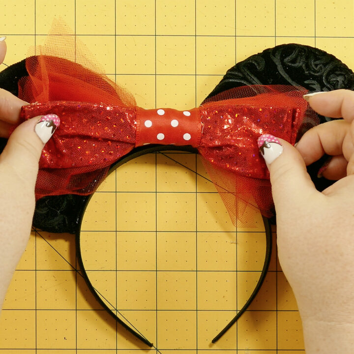 Adjust the bow on the DIY Mouse Ears