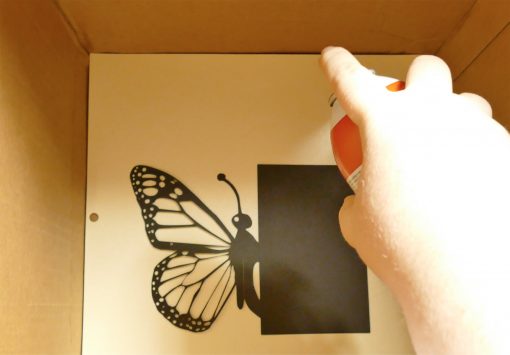 Spray adhesive on the butterfly wings for the pop up butterfly card