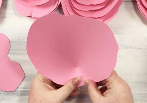 Glue the bottom of each petal to create a cup shape