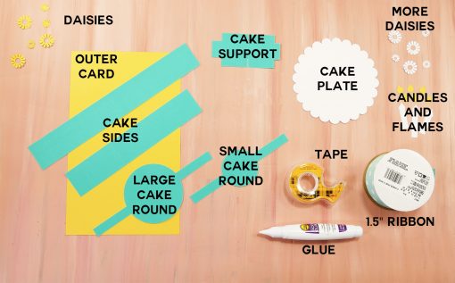 What you need to make a pop-up birthday cake card: cardstock, tape, glue, and ribbon