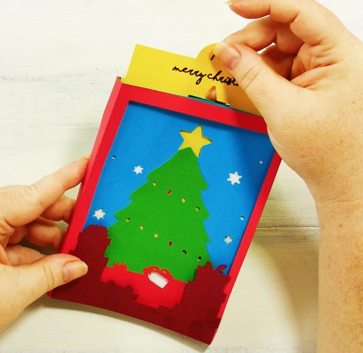 Insert the yellow slider card into your Christmas tree shadow box card