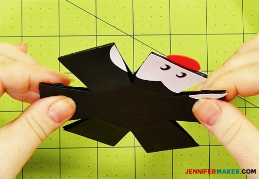 Attach the head together for the penguin paper bomb