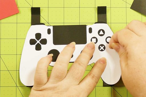 Attach the labels on the buttons of the the pop-up section of the pop-up game controller card