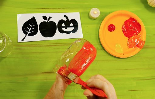 Paint the entire outside of your glass jar with acrylic paint