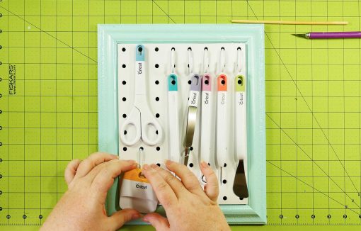 Arrange your tools and pegs on the board