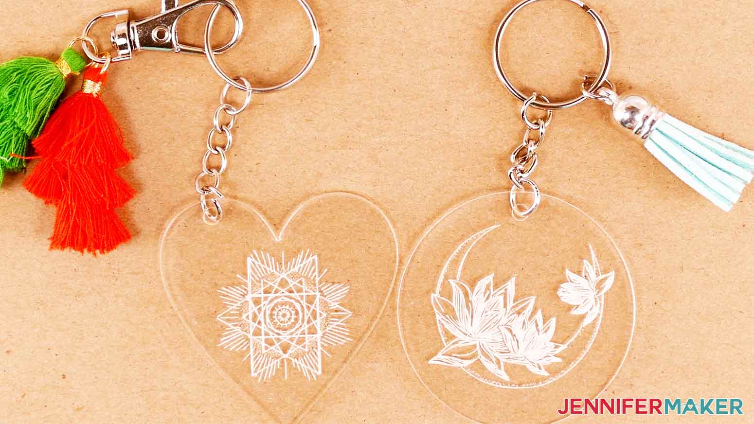 A picture of uniquely shaped acrylic engraving on keychains.
