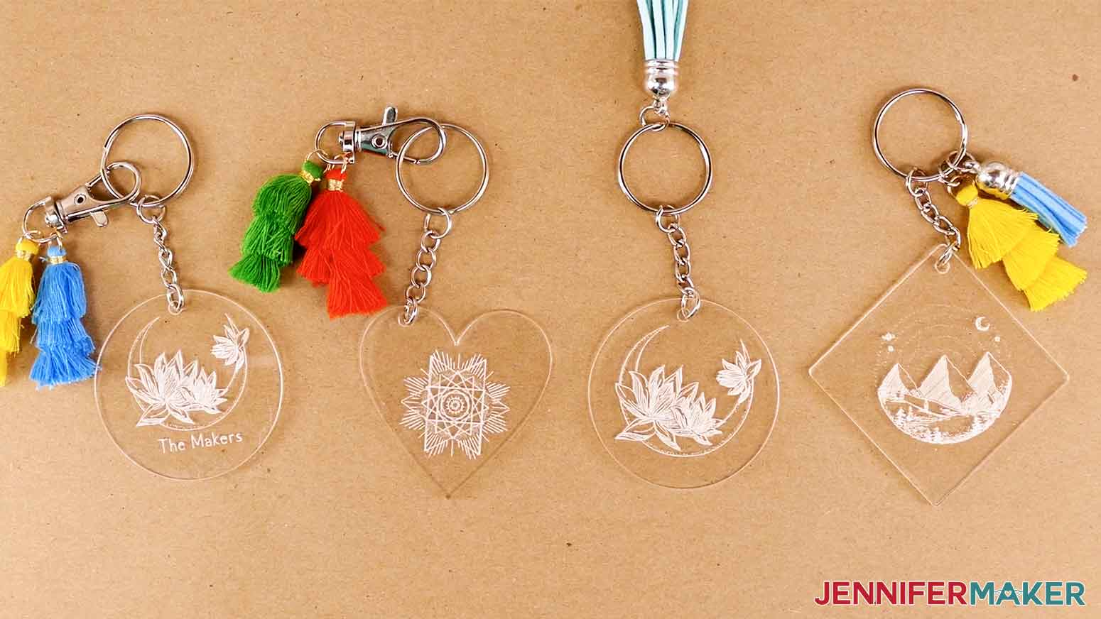 A picture of a variety of acrylic engraving on keychains.