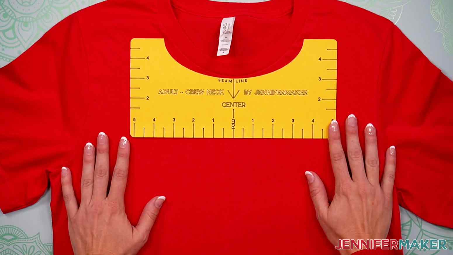 The T-Shirt-Ruler properly placed on the adult crew-neck t-shirt centered with the crease and the collar seam.