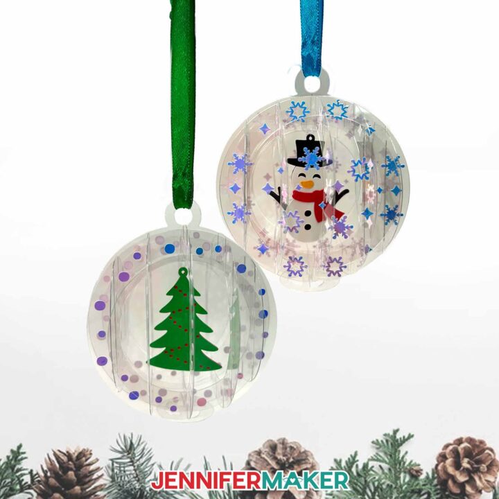 Two complete 3D Christmas ornaments made of acetate: one with a cardstock tree in the center and one with a layered snowman in the center.