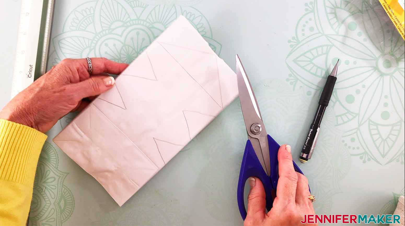 use heavy duty scissors to cut the design drawn on your bags for my 3D Snowflake