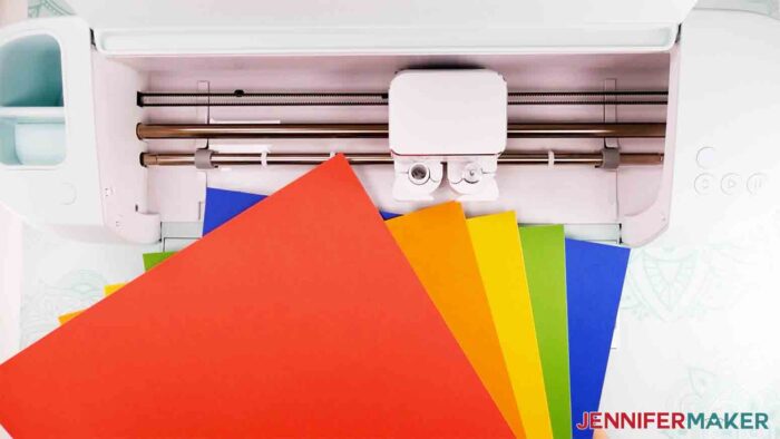 Fanned rainbow colored cardstock with a Cricut cutting machine.
