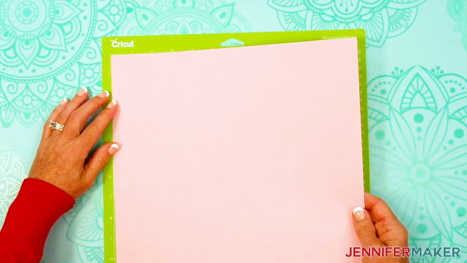 Place the regular cardstock face up on a Cricut green StandardGrip machine mat.