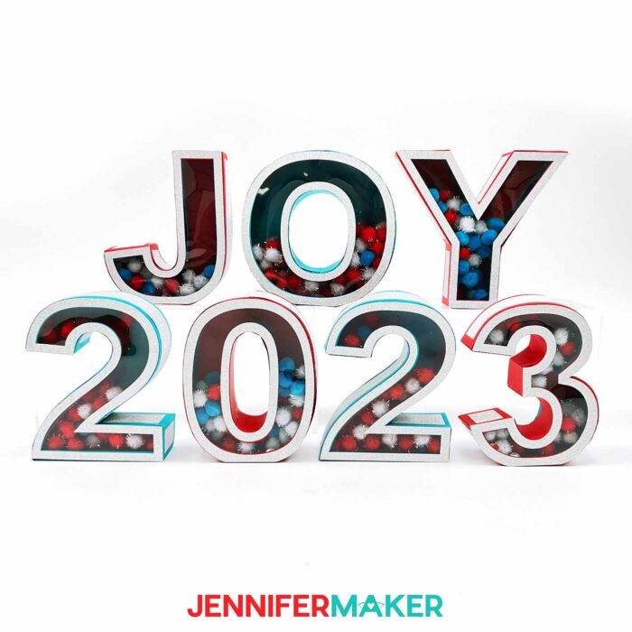 3D Shaker Letters spelling JOY 2023.
