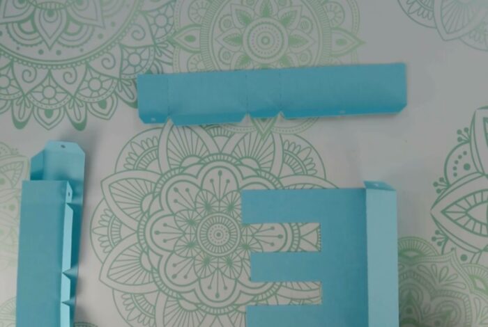 A cardstock letter E ready to be assembled for DIY Floral Letters