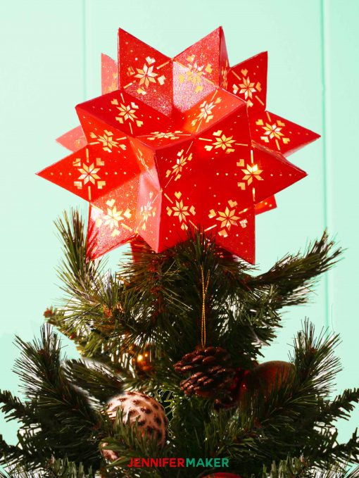 Moravian star tree topper made of cardstock. Make Cricut Christmas Ornaments with JenniferMaker's tutorial!