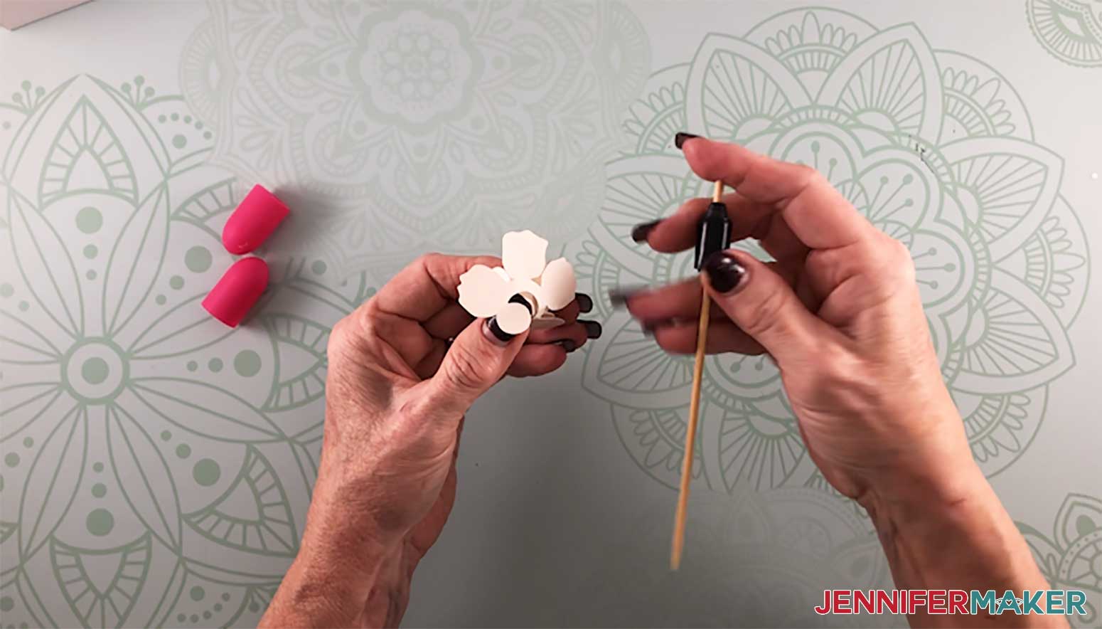 Rolling a paper rose with a DIY quilling tool to make a paper flower shadow box