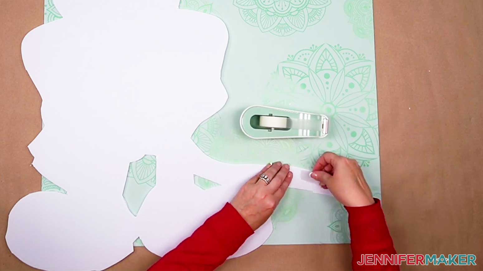 Tapping pieces of the plastic sheets together for a larger DIY Cut Out Character.