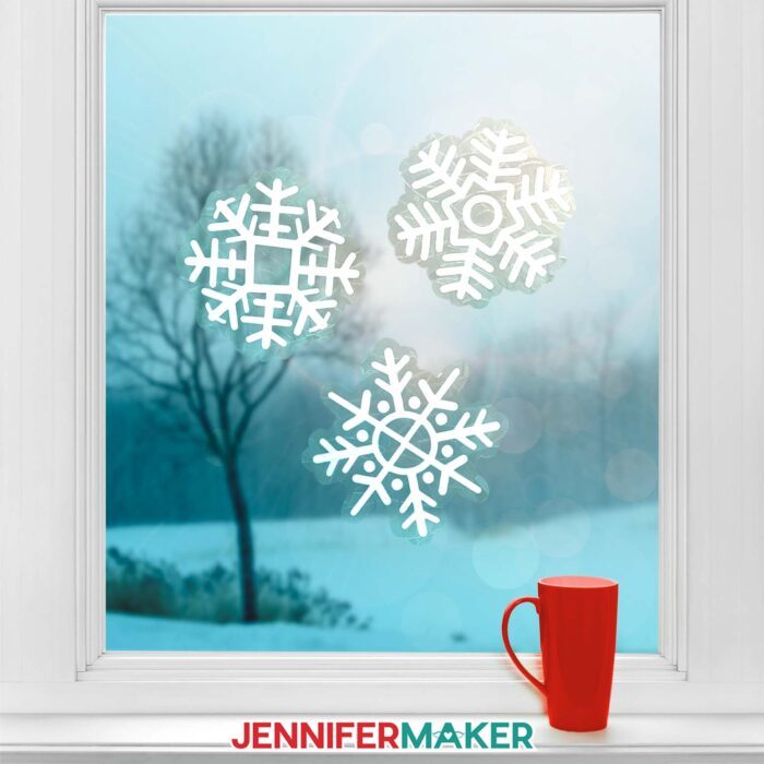 Three snowflake winter window clings