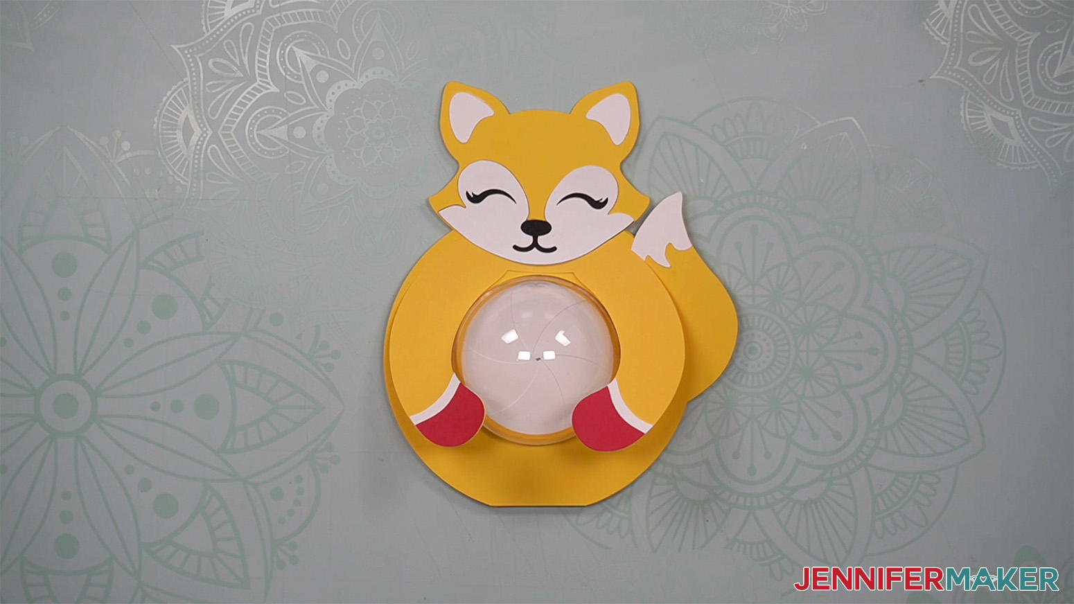 Image showing the placement of the ears on the fox candy holder.