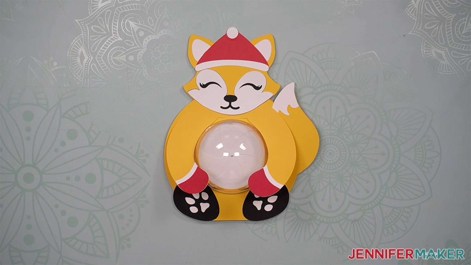Image showing the paws of the fox placed in the correct location on the body of the fox candy holder.