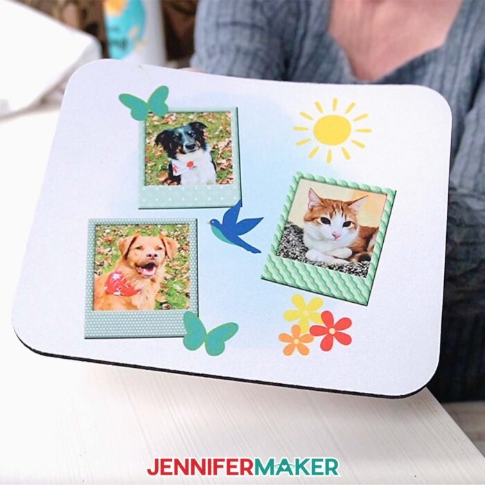 A close-up look at Jennifer's Canva-printed mousepad with photos of her pets Hunter, Chloe, and Butterscotch.