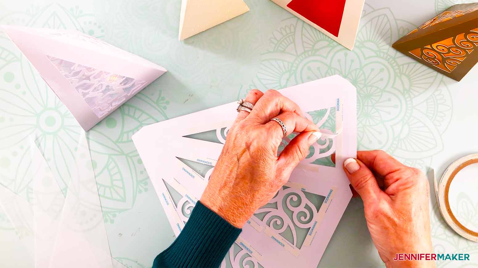 remove the paper backing off the double sided tape on my Christmas Tree Luminary