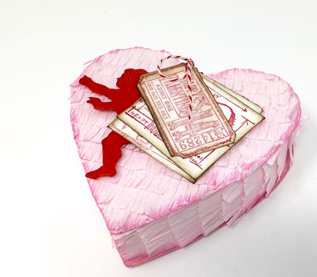 A pretty pink paper heart box made by PaperGlitterGlue.com