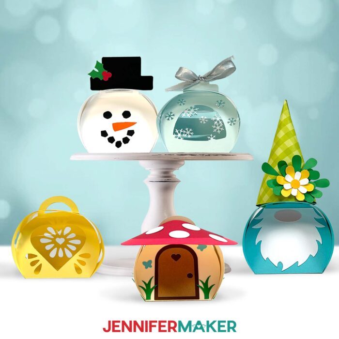 Collection of Curvy Keepsake Boxes on display, made of cardstock and featuring a mushroom house, a snowman, a custom cutout box, and others