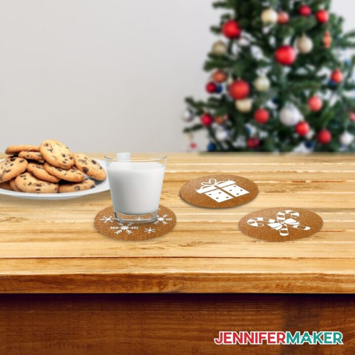 Custom Cork Coasters with a cup of milk, cookies, and a Christmas tree in the background