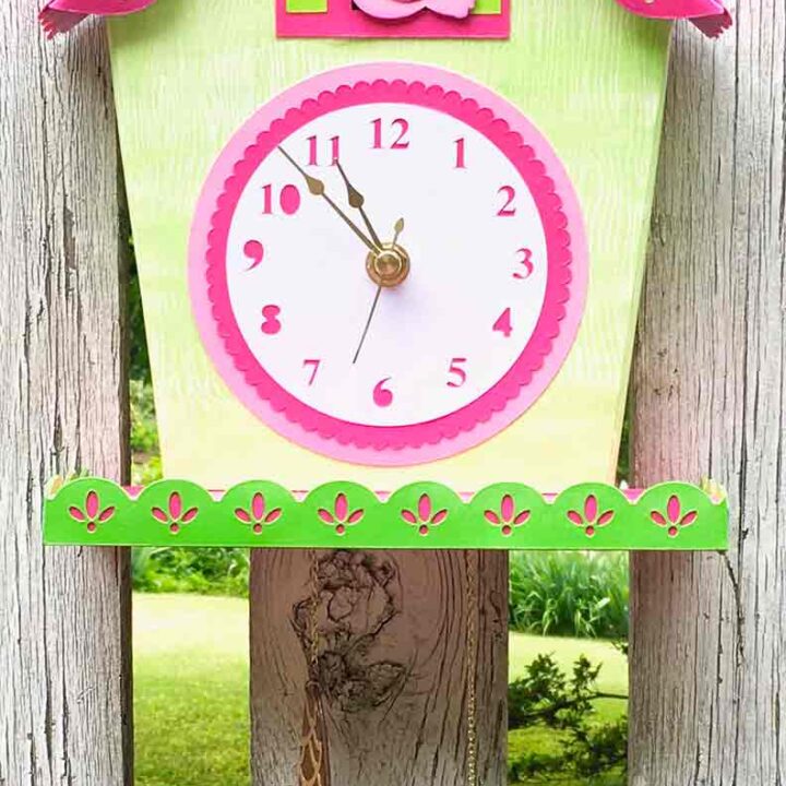 Finished pink and green floral baby shower gift tutorial of a DIY cuckoo clock