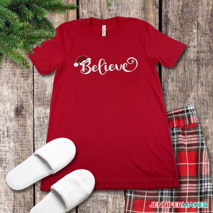 DIY custom t-shirt in a red color with the word "believe" on it