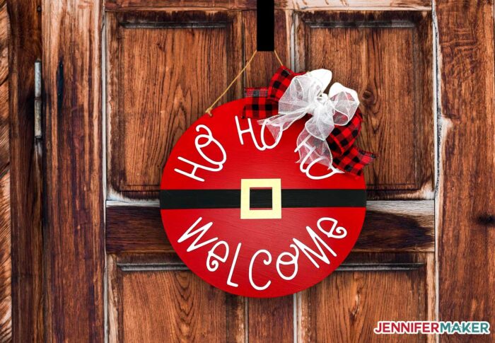 Red Santa Welcome sign on a DIY Door Hanger