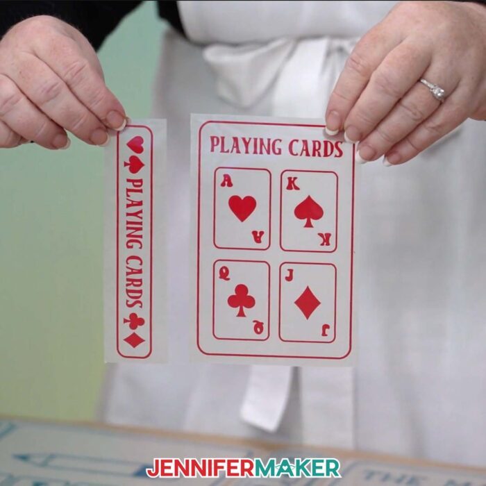 Learn how to make a DIY Board Game Box to store all your game pieces with JenniferMaker's tutorial! Jennifer holds up iron-on vinyl labels and decals for a small Playing Cards book box.