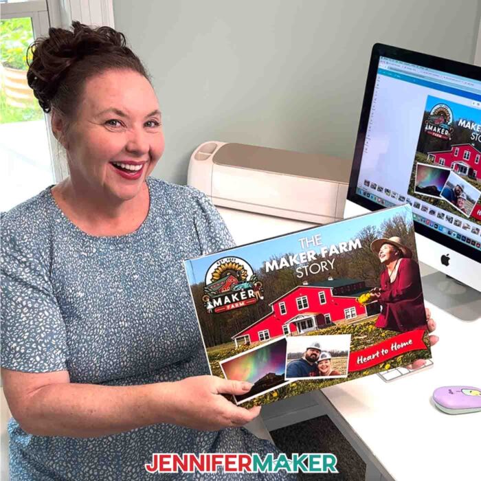 Jennifer Maker sits at her computer desk and shows off the DIY Photo Book she created with Canva