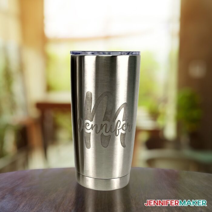 DIY Etched Stainless Steel Tumbler on a wooden surface