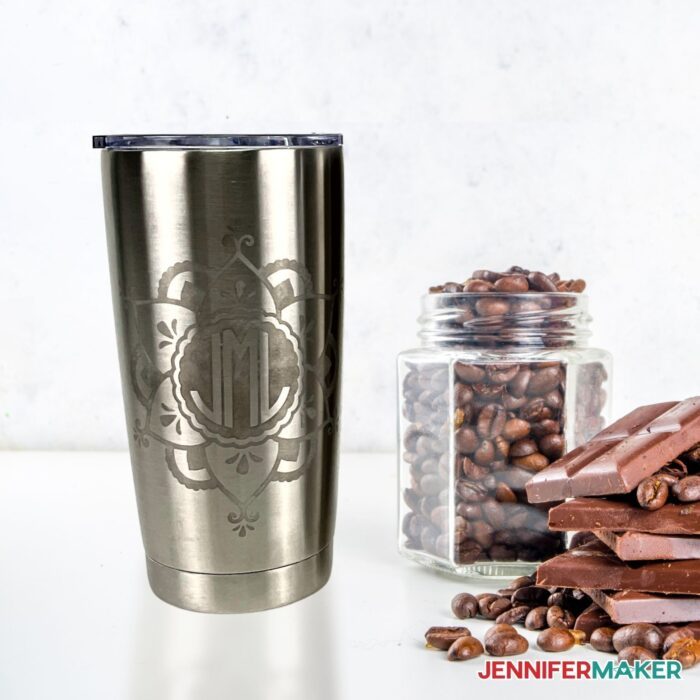 Etched Stainless Steel Tumbler with coffee beans and chocolate beside