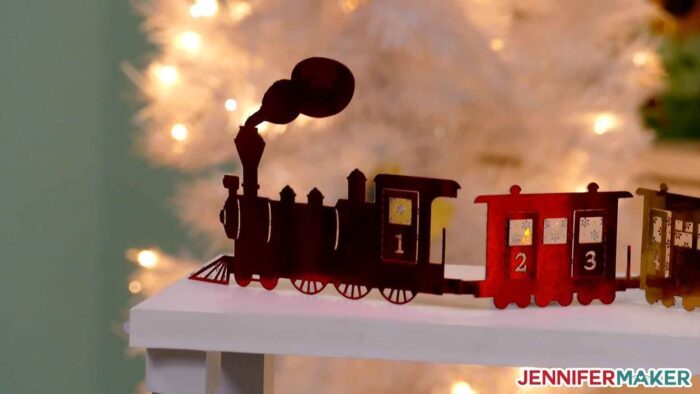 Holiday Paper Train made from foil Kraft board on the Cricut 