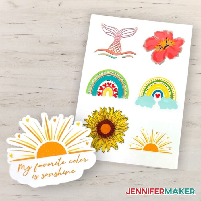 Sticker sheet and single sticker on a light wooden background