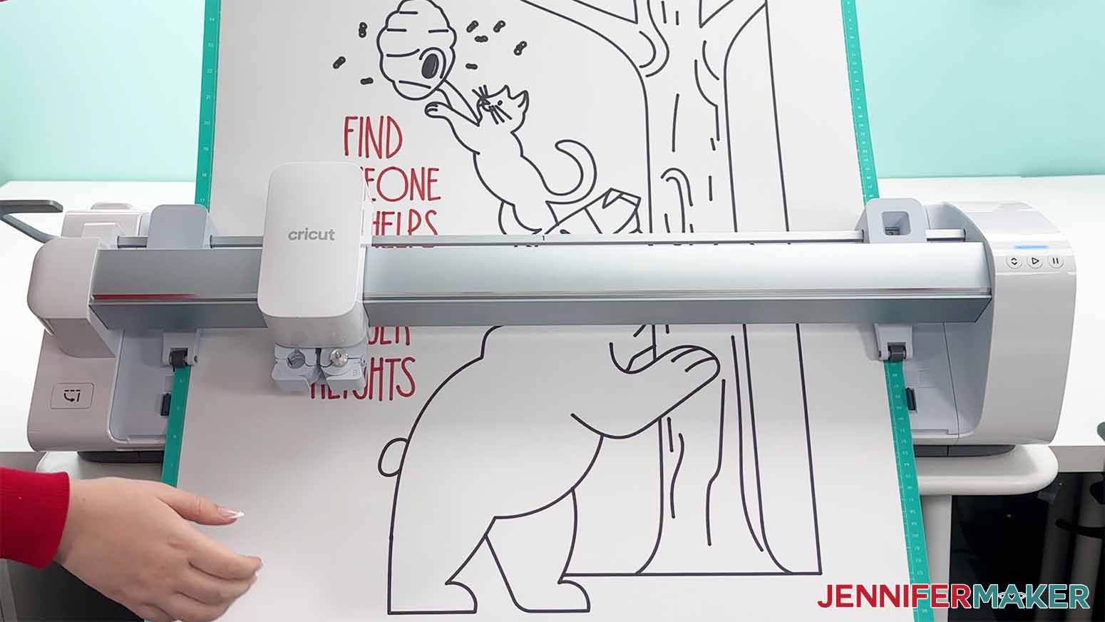 How to Draw with Cricut. An image of the mat being removed from the Cricut Venture for the bigger heights poster.