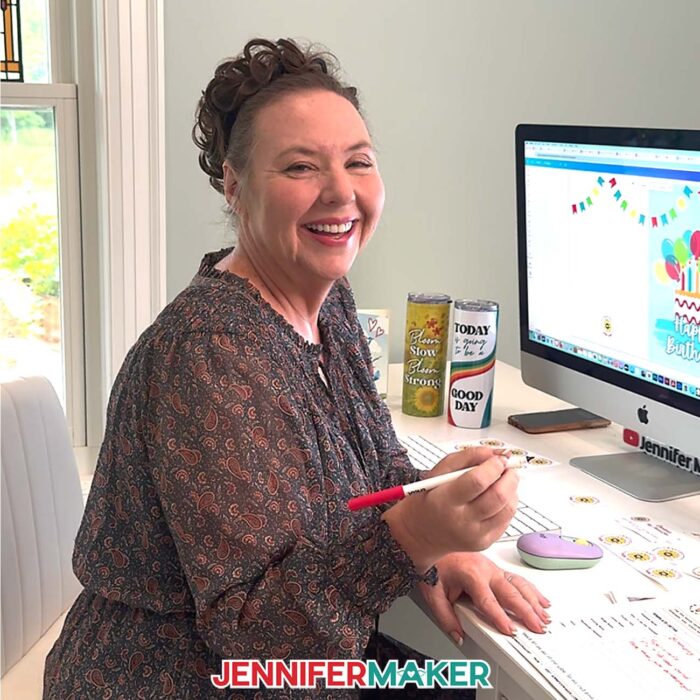 Learn How To Make Canva Templates with the free tutorial! Jennifer Maker uses the reference guide pages at her computer desk