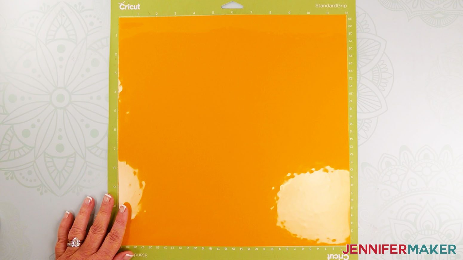 Image showing adhesive vinyl applied to cutting mat vinyl side up.