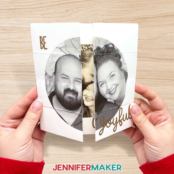 Make a custom infinity card with JenniferMaker's tutorial! Jennifer holding an infinity card with a photo of her and Greg on the front, with the sentiment "Be Joyful" written in copper pen. The card is partially open in the middle, revealing a peek at another photo of the happy couple!