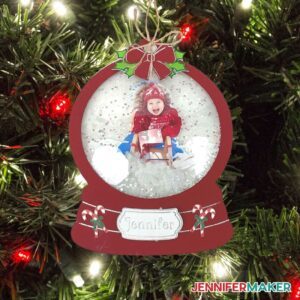 Photo Snowglobe Ornament hanging in a Christmas Tree