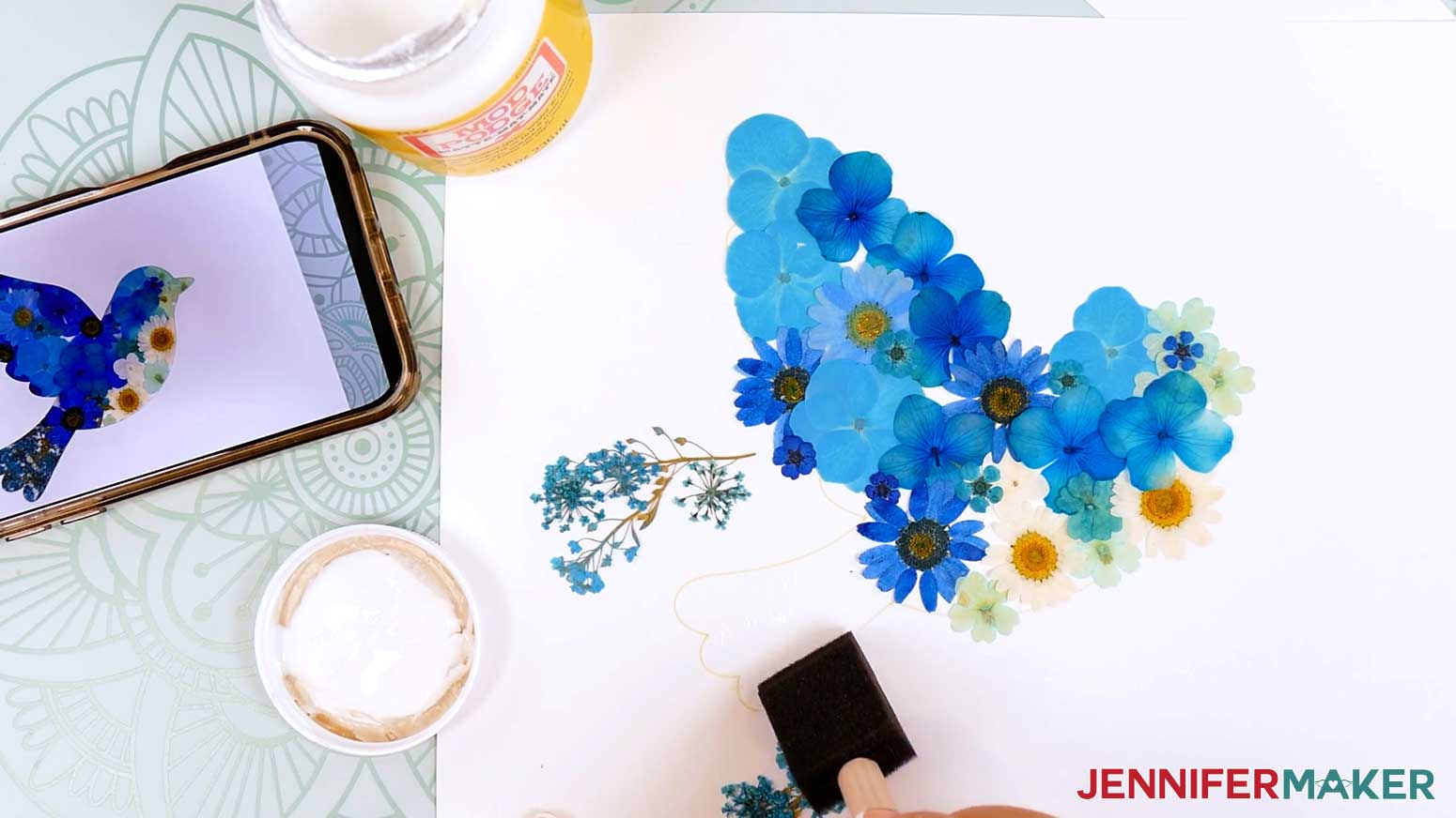 Use Mod Podge to adhere the dried flowers in place.
