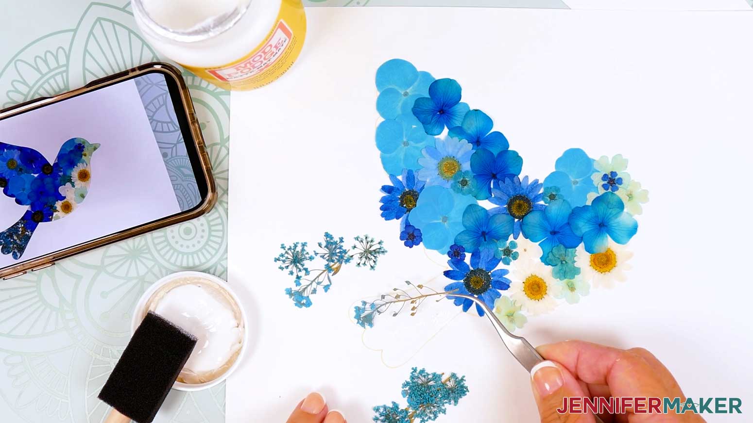 Place the delicate flowers in place within the design line.