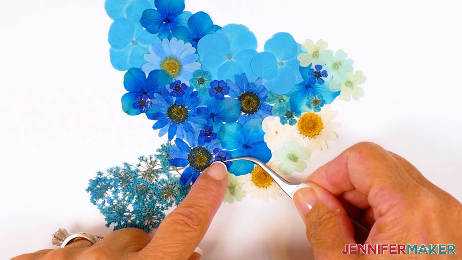 Overlap any flowers with tears or ripped flowers.
