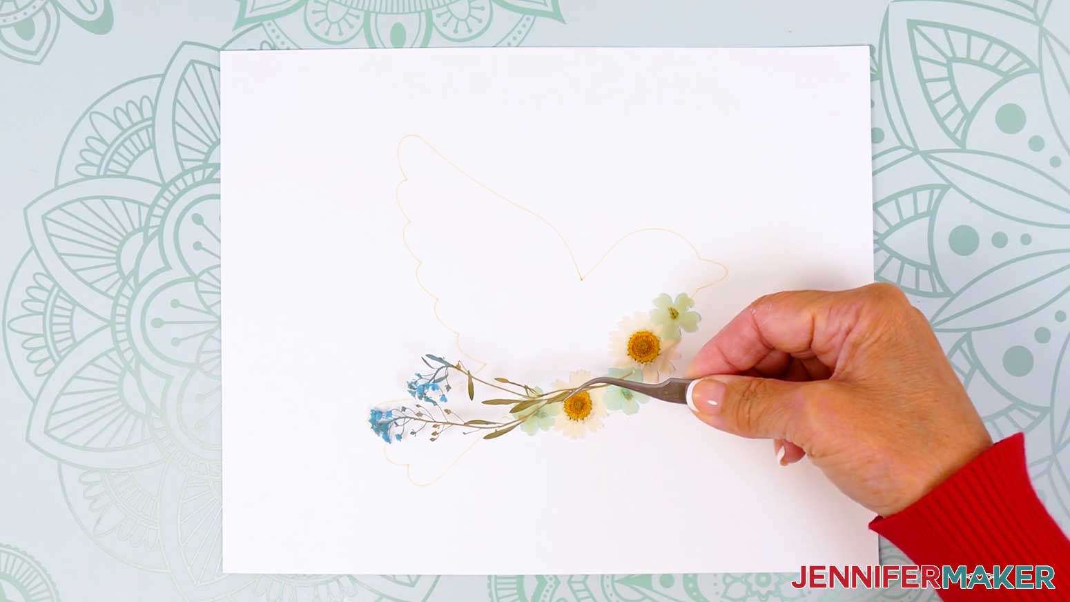 Use the tweezers to place the flowers in place.
