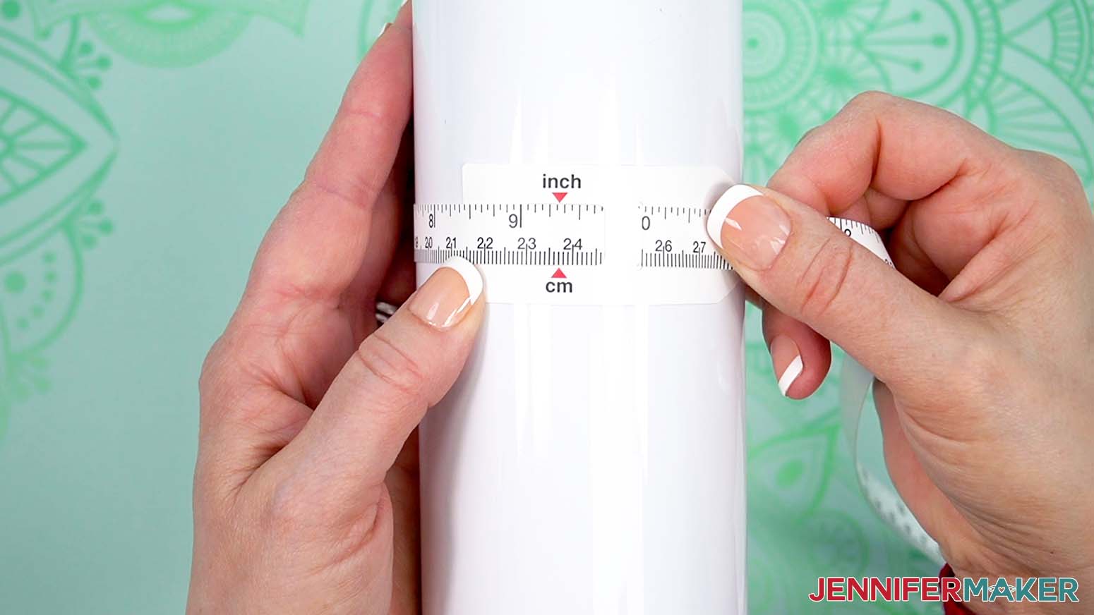 Wrap the looped tape measure tightly around the tumbler and look for the size at the arrow.